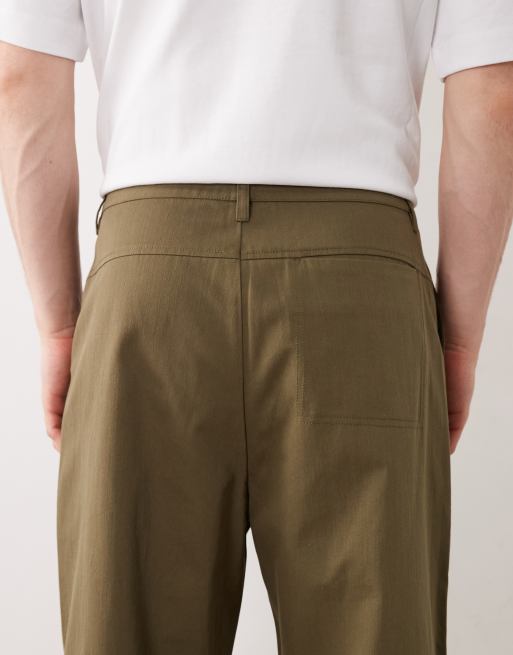 Pantalones caquis elásticos de corte tapered holgado de ASOS DESIGN, 6 de 6