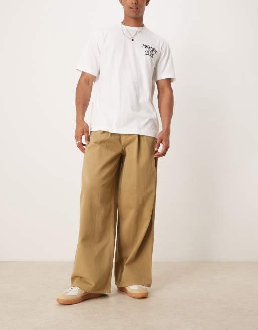 Pantalones caquis muy holgados con detalle de pinza marcada de ASOS DESIGN
