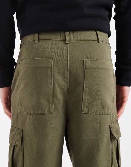 Pantalones cargo caquis de corte tapered holgado de ASOS DESIGN, 4 de 5