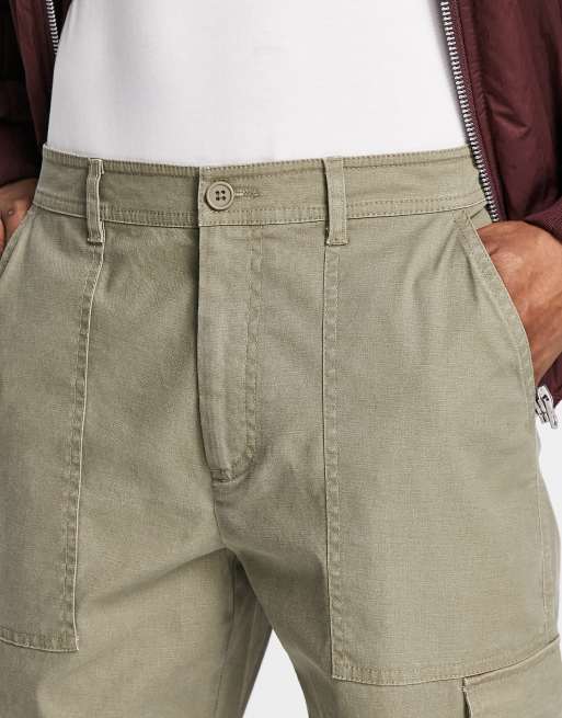 Pantalones cargo caquis lavados de corte tapered de ASOS DESIGN, 4 de 4