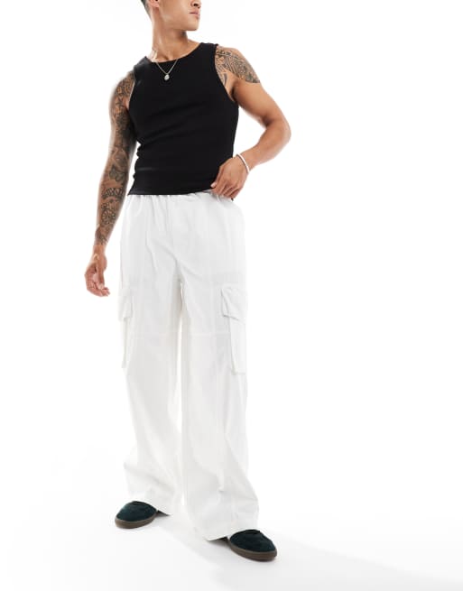 Pantalones cargo color crudo de corte muy holgado con detalle de paneles de ASOS DESIGN, 4 de 5