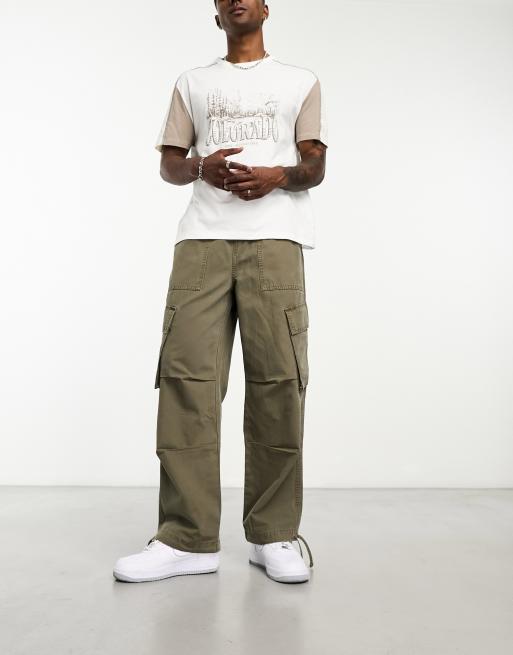 Pantalones cargo de estilo paracaidista con lavado color caqui de ASOS DESIGN, 2 de 4