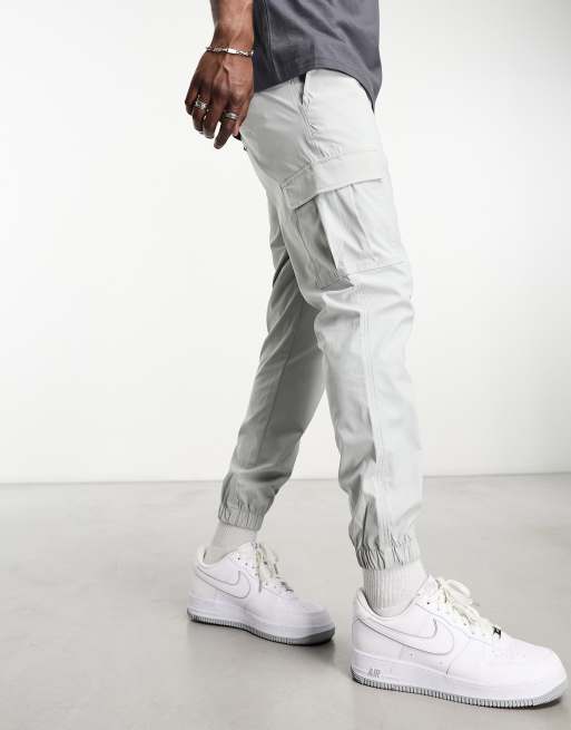 Pantalones cargo de corte slim con bajos ajustados en color arena claro de  Jack & Jones Intelligence, ASOS