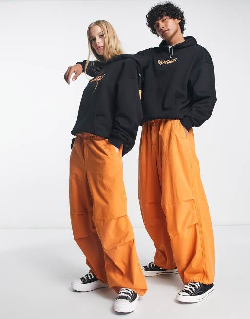 Pantalones cargo naranja tostado unisex de estilo paracaidista de Reclaimed Vintage