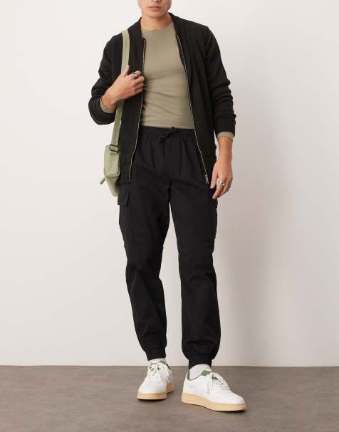 Pantalones cargo negros con bajos ajustados de New Look - view 1