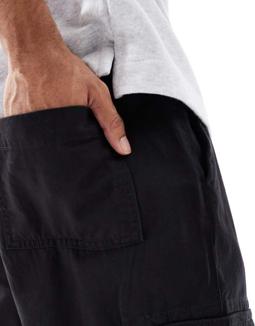 Pantalones cargo negros con bajos ajustados de New Look, 3 de 5