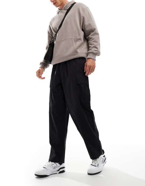 Pantalones cargo negros de estilo paracaidista y pernera ancha de Another Influence - view 1