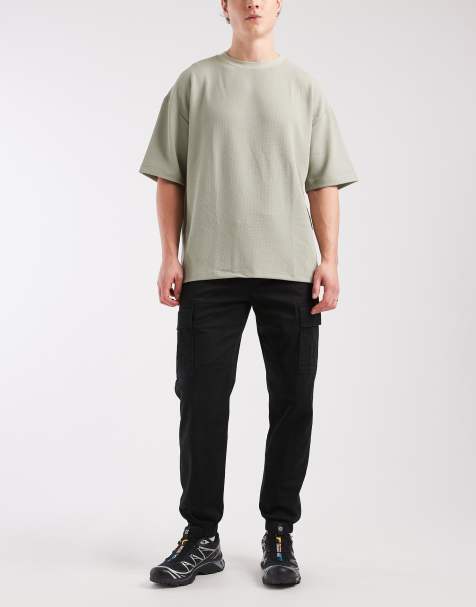 Pantalones cargo negros holgados con bajos ajustados de Hollister - view 1