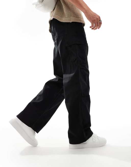 Pantalones cargo negros holgados con pliegues en las rodillas de ASOS DESIGN