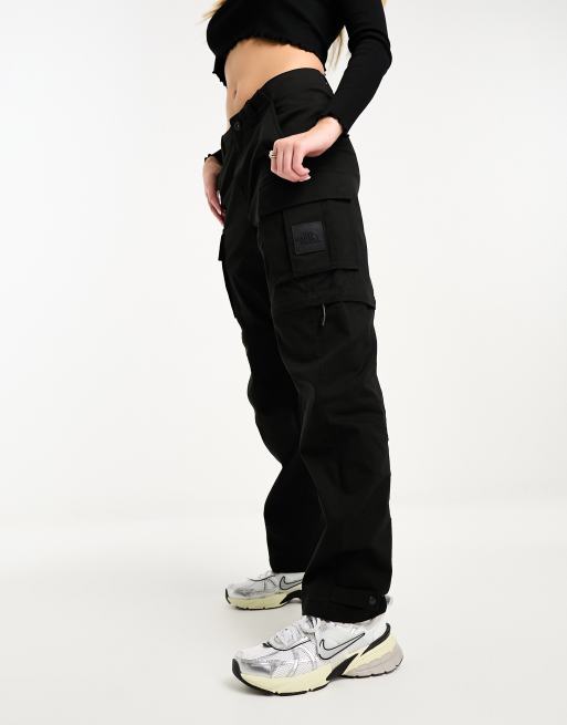 Pantalones cargo negros holgados convertibles con cremallera NSE Convin de  The North Face