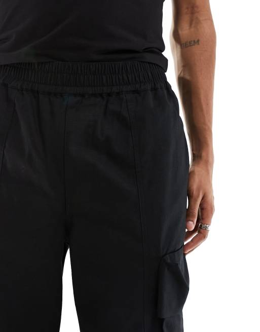 Pantalones cargo negros holgados de ASOS DESIGN ASOS