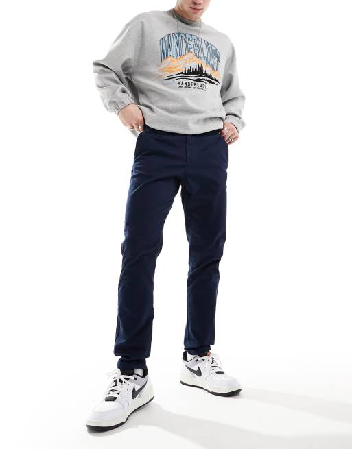 Pantalones chinos azul marino de corte slim de Selected Homme