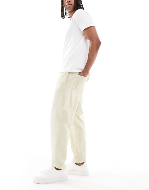Pantalones chinos beis de corte tapered sin cierres de ASOS DESIGN, 3 de 5