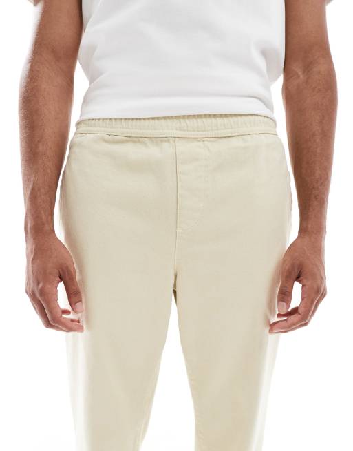 Pantalones chinos beis de corte tapered sin cierres de ASOS DESIGN, 5 de 5