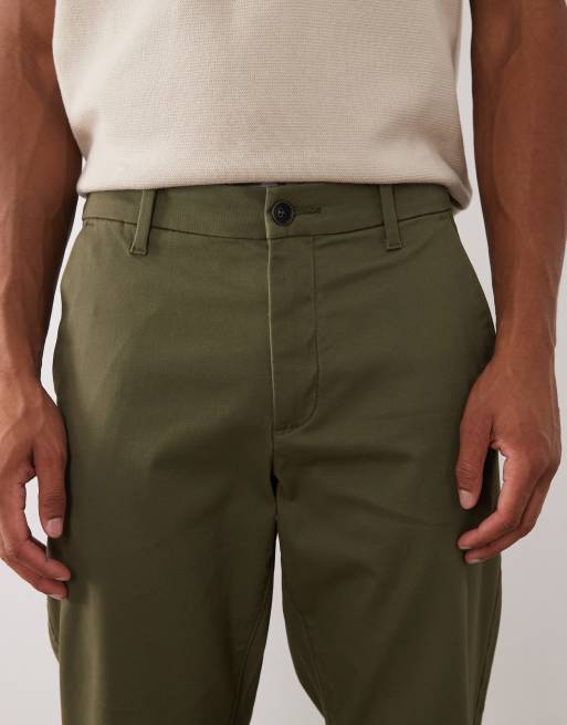 Pantalones chinos caquis de corte tapered de ASOS DESIGN, 5 de 6