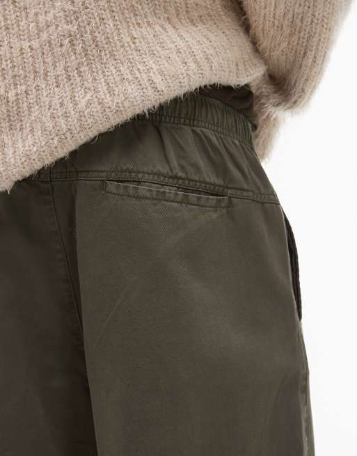 Pantalones chinos caquis holgados de sarga de Topman, 5 de 5