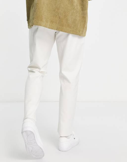 Pantalones chinos color crema de corte slim con cinturilla elástica de ASOS DESIGN, 2 de 4