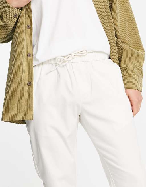 Pantalones chinos color crema de corte slim con cinturilla elástica de ASOS DESIGN, 3 de 4
