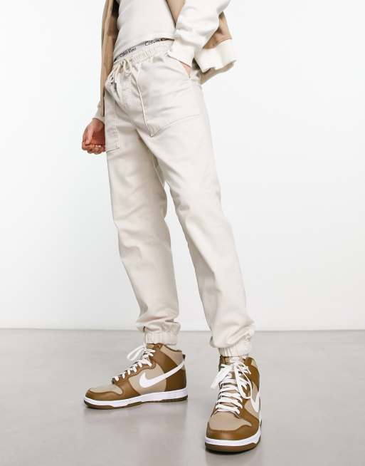 Pantalones chinos color crema estilo worker con bajos ajustados de Jack & Jones Intelligence