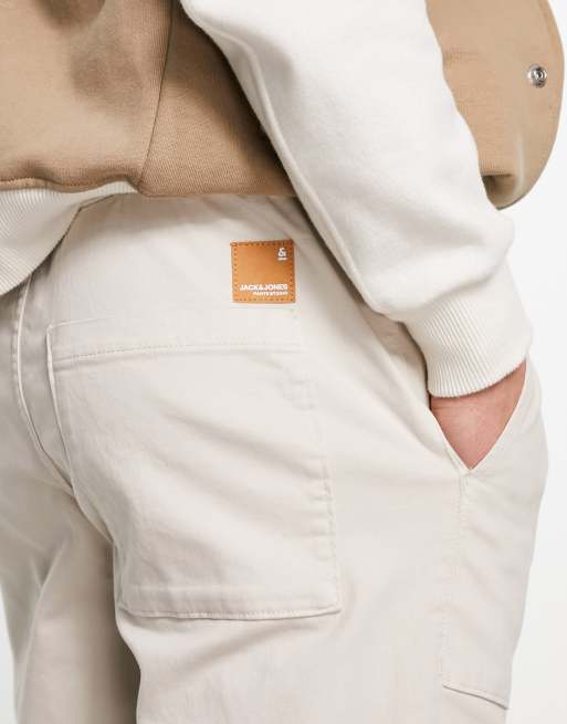 Pantalones chinos color crema estilo worker con bajos ajustados de Jack & Jones Intelligence, 3 de 4