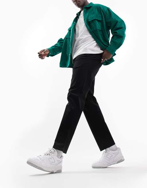 Pantalones chinos de corte skater holgado en negro de ASOS DESIGN, 3 de 4