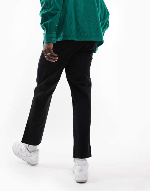 Pantalones chinos de corte skater holgado en negro de ASOS DESIGN, 4 de 4