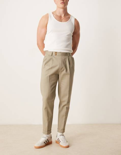 Pantalones chinos de vestir caquis de corte tapered de algodón de ASOS DESIGN - view 1