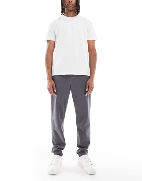 Pantalones chinos gris carbón de corte tapered sin cierres de ASOS DESIGN - view 1