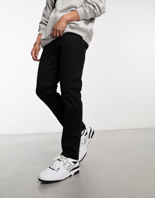 Pantalones chinos negros de corte slim de New Look