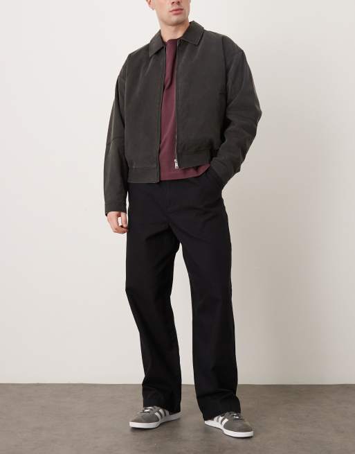 Pantalones chinos negros de corte suelto de ASOS DESIGN, 2 de 5