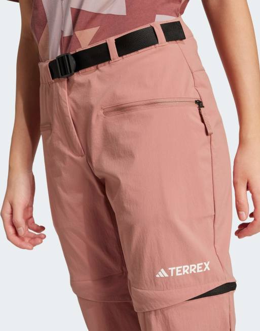 Pantalones color arcilla cálido con diseño convertible mediante cremallera Terrex Utilitas Hiking de adidas