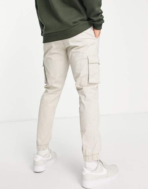 Pantalones cargo de corte slim con bajos ajustados en color arena claro de  Jack & Jones Intelligence, ASOS