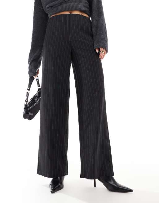 Pantalones color avena sueltos de pernera ancha sin cierres con raya diplomática de Vero Moda