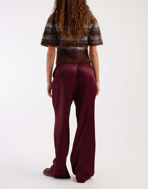 Pantalones color ciruela sin cierres de pernera ancha de satén de ASOS DESIGN, 3 de 5