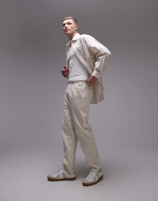 Pantalones color crudo de corte tapered de pana de Topman