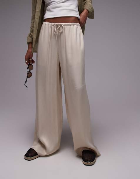 Pantalones color crudo de pernera ancha con lazada en la cintura de satén de Topshop - view 1