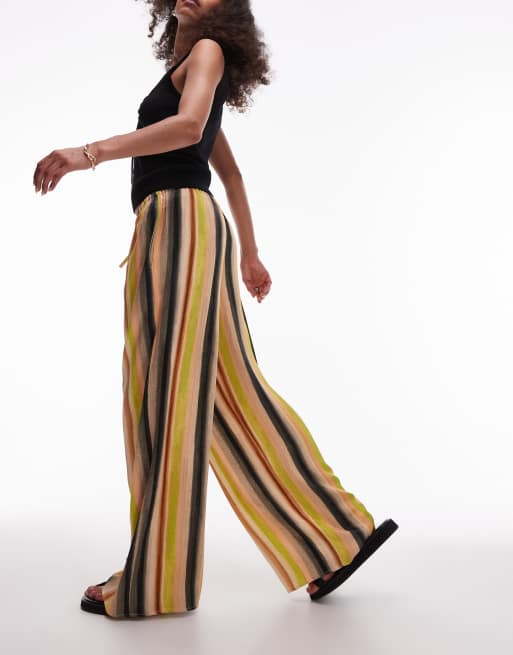 Pantalones color melocotón a rayas de pernera ancha con lazada en la cintura de satén de Topshop
