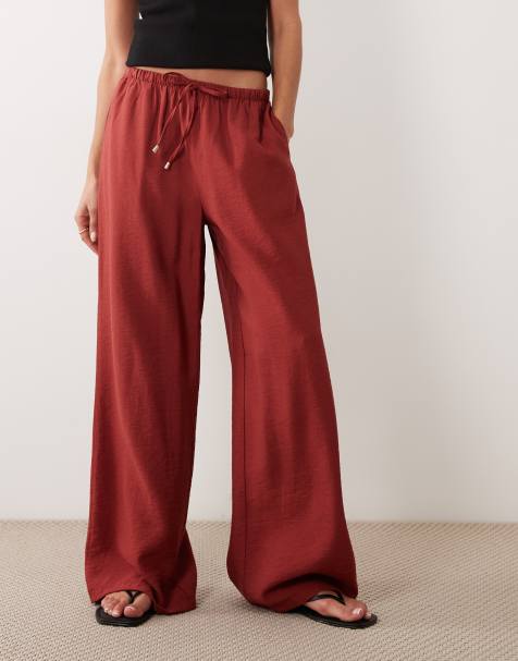 Pantalones color óxido de pernera ancha de tejido liso de New Look - view 1