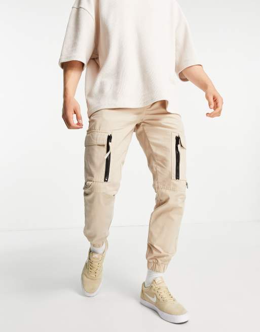 Pantalones color piedra cargo de corte pitillo con detalle de cremallera de Topman
