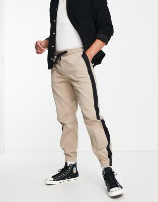 Pantalones color piedra con banda lateral y cintura elástica de corte holgado de Topman