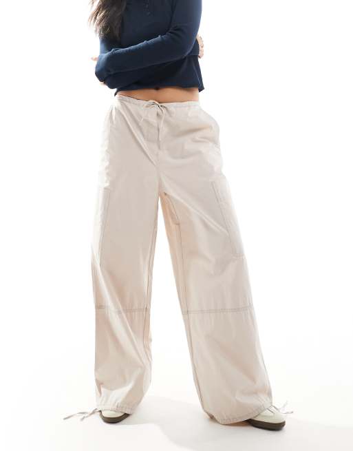 Pantalones color piedra con cordones en el bajo y bolsillo utilitario liso de ASOS DESIGN 