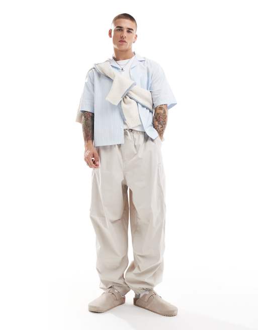 Pantalones color piedra holgados y extragrandes cargo de estilo paracaidista de ASOS DESIGN