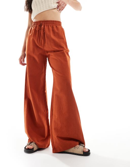 Pantalones color terracota de pernera ancha con lazada en la cintura de mezcla de lino de ASOS DESIGN