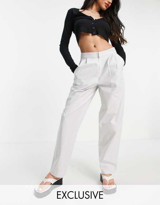 Pantalones con pernera tipo globo en beis de COLLUSION 