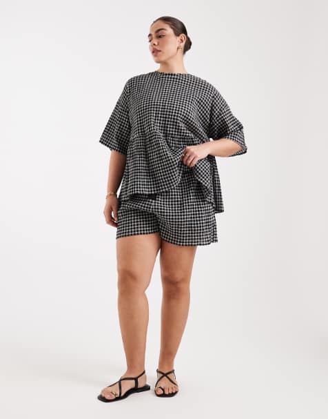 Pantalones cortos a cuadros con detalle de bolsillo y lazada en la cintura de ASOS DESIGN Curve - view 1