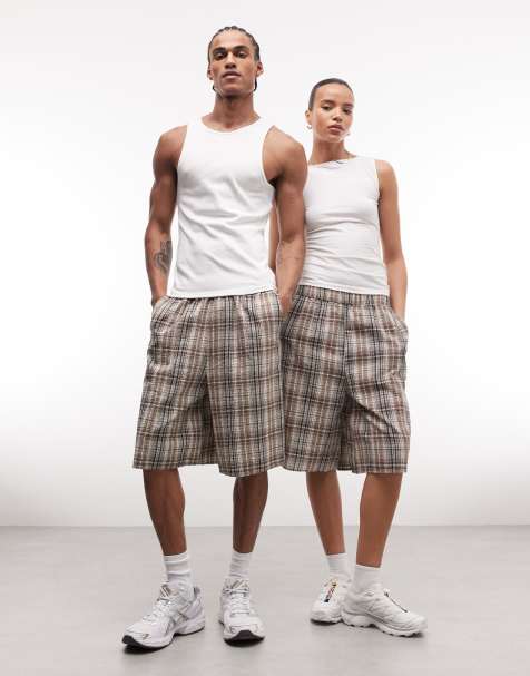 Pantalones cortos a cuadros marrones de corte alargado de COLLUSION Unisex - view 1