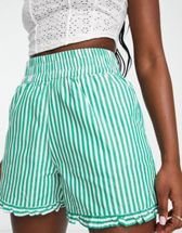 Pantalones cortos verdes con las tres rayas de adidas Originals