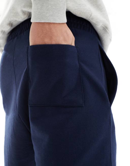 Pantalones cortos ajustados en azul marino de ASOS DESIGN, 4 de 5