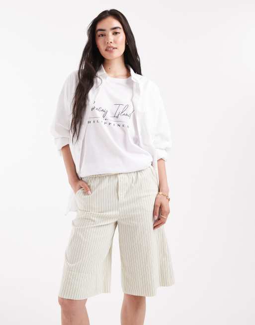 Pantalones cortos amarillo pastel a rayas de estilo bóxer y corte alargado de ASOS DESIGN, 2 de 5
