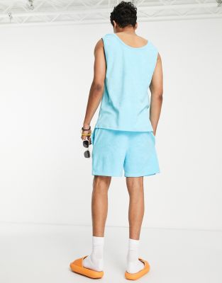 Pantalones cortos azul aguamarina de tejido de rizo de COLLUSION (parte de un conjunto)